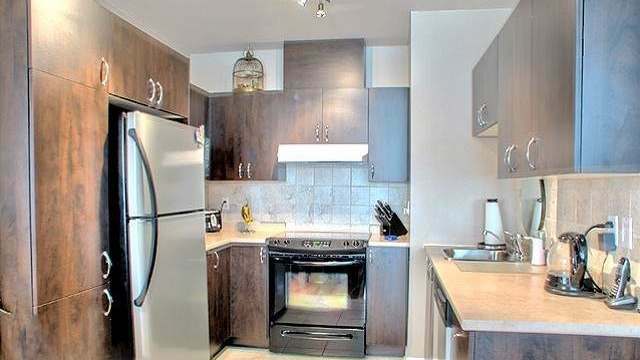 Condo 4 1/2 A Vendre BEACOUP D'EXTRAS