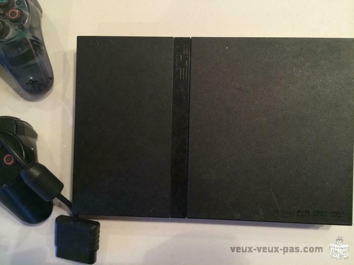 PS2 AVEC 2 MANETTES ET TOUT LES FILS EN BON ETAT 50$